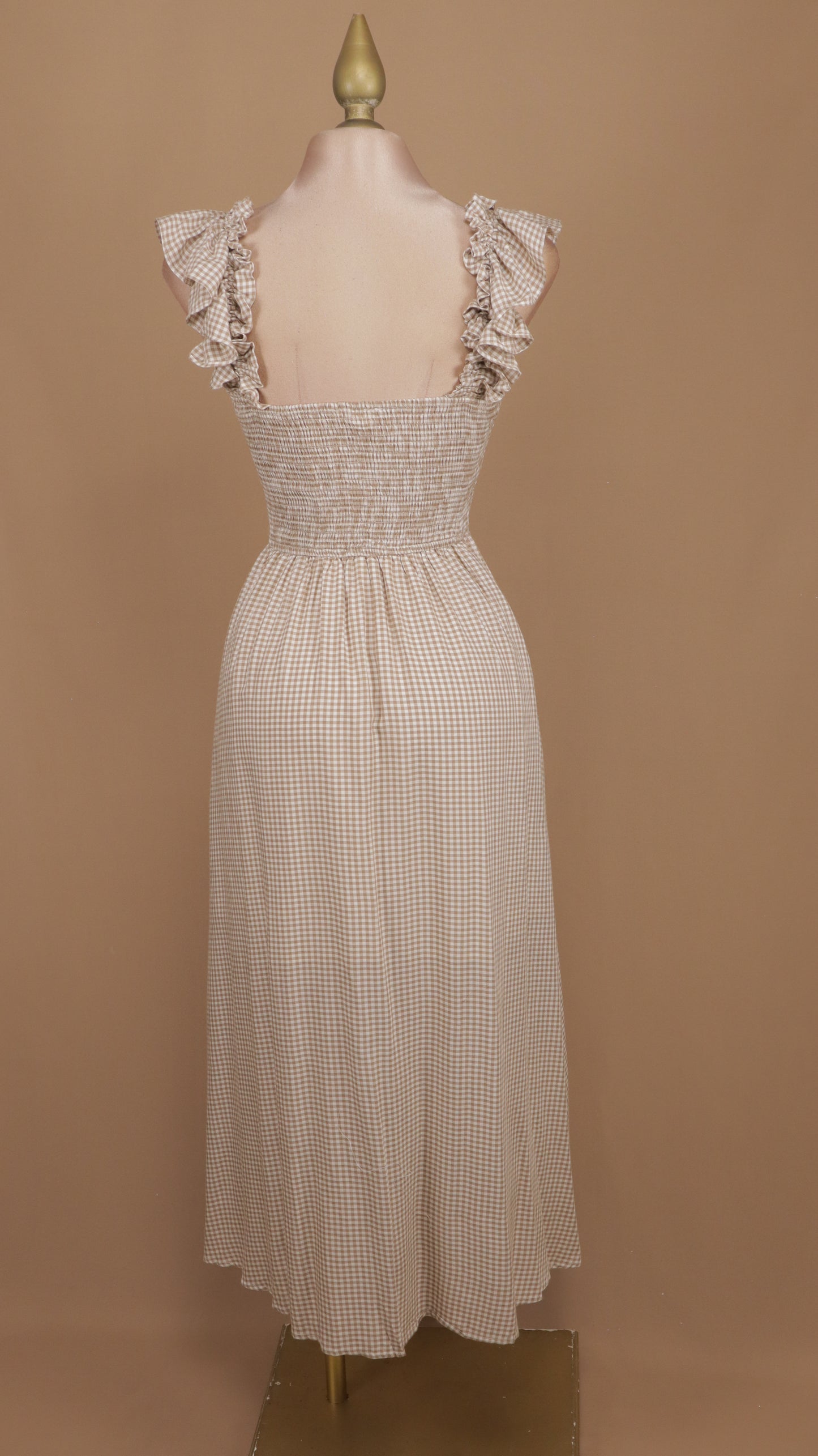 Vestido midi cuadricular con moños en busto