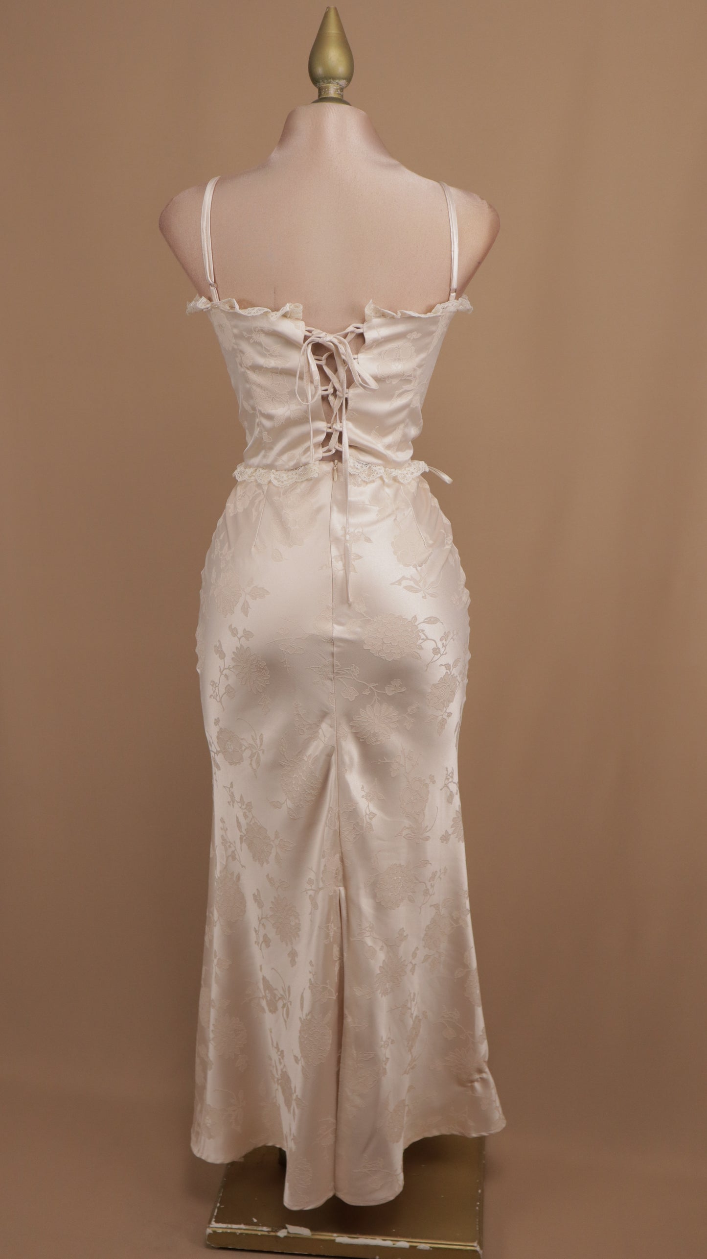 Conjunto de falda y blusa de corset satinada con estampado