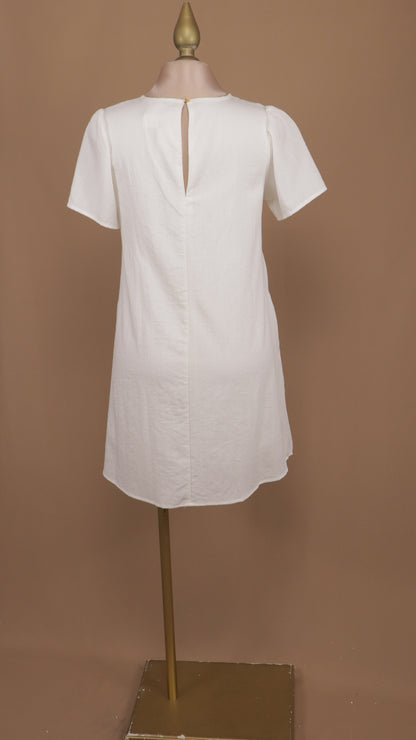 Vestido corto tipo bata con moños en busto