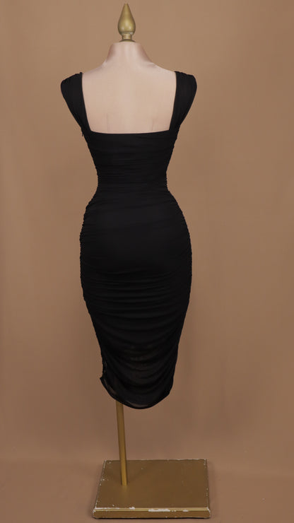 Vestido midi pegadito con abertura en pierna