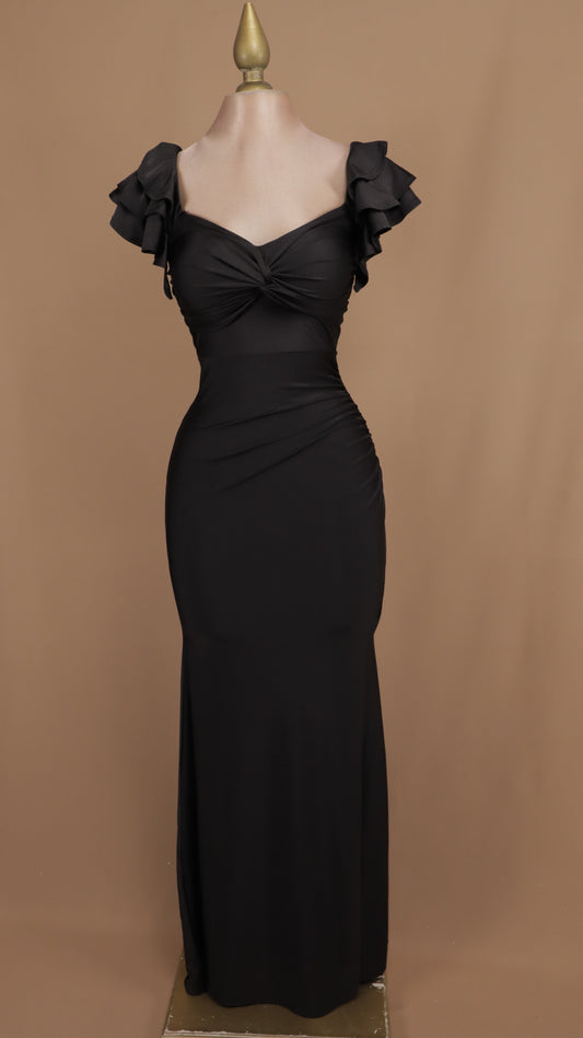 Vestido de licra con manga de olanes y abertura
