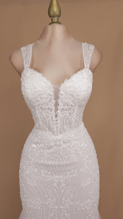 Vestido largo con tirantes y aplicación