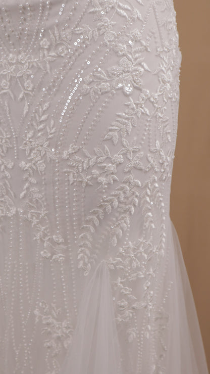 Vestido largo con tirantes y aplicación