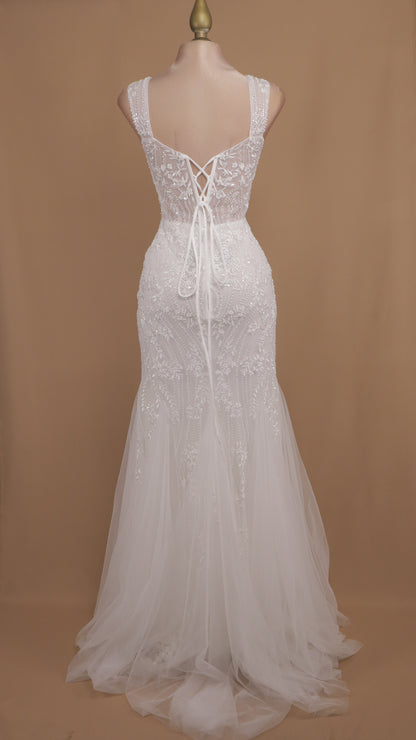 Vestido largo con tirantes y aplicación