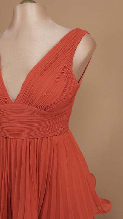 Vestido largo de olanes y plisado