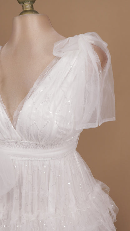 Vestido largo con olanes y escote en V