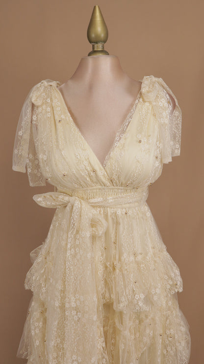 Vestido largo de tul con perlas y bordado