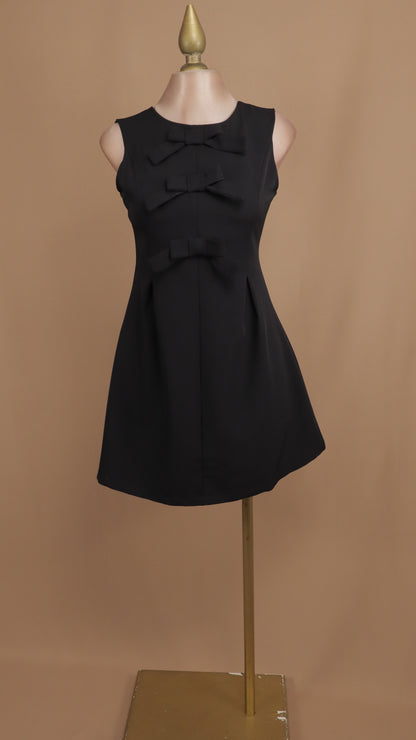 Vestido corto de moños resacado