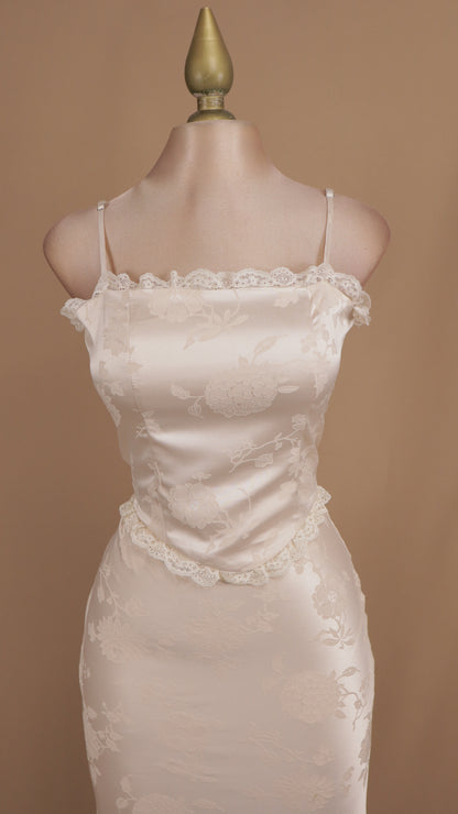 Conjunto de falda y blusa de corset satinada con estampado