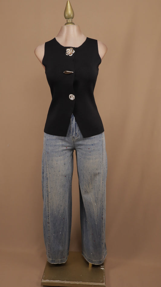 Pantalón deslavado con estoperoles