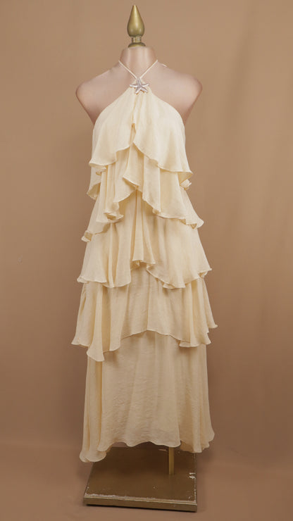 Vestido largo con olanes y cuello halter