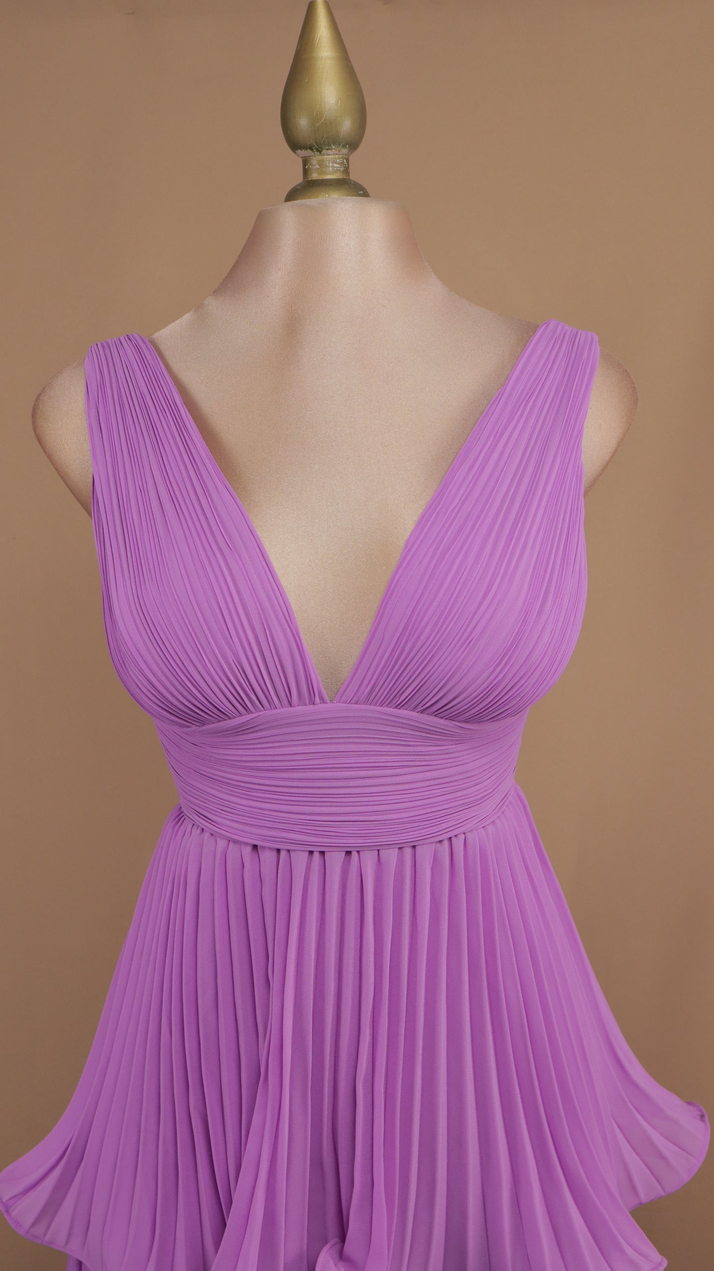 Vestido largo de olanes y plisado