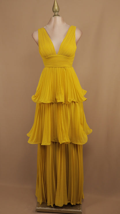 Vestido largo de olanes y plisado