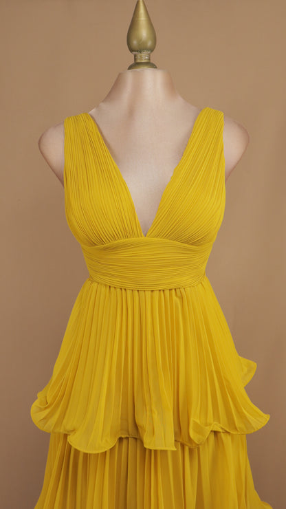 Vestido largo de olanes y plisado