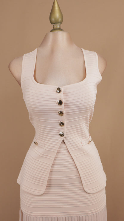 Conjunto de falda plisada y blusa