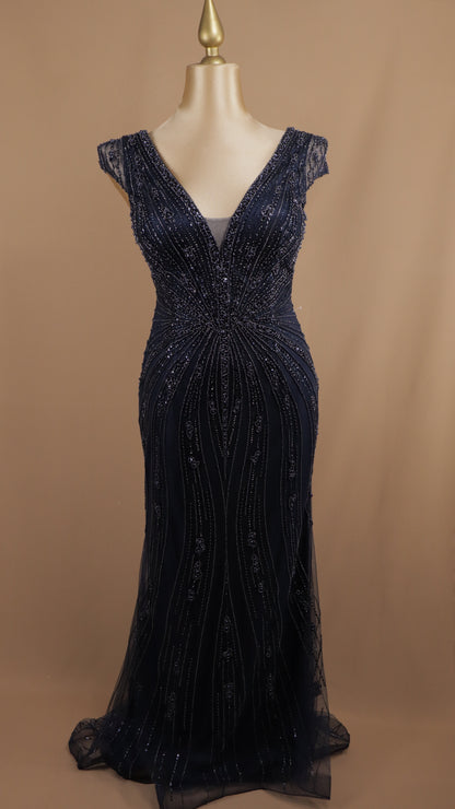 Vestido largo extra con aplicación y escote en V