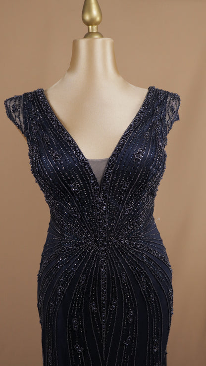 Vestido largo extra con aplicación y escote en V