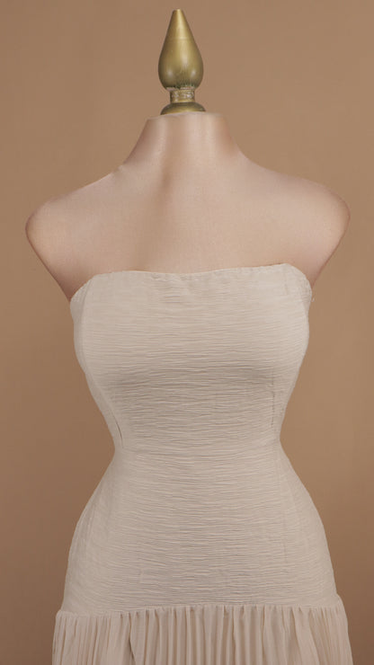 Vestido largo estraple con pastelones en falda