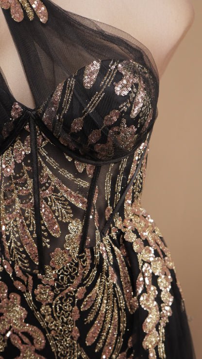 Vestido largo asimétrico con capa en falda