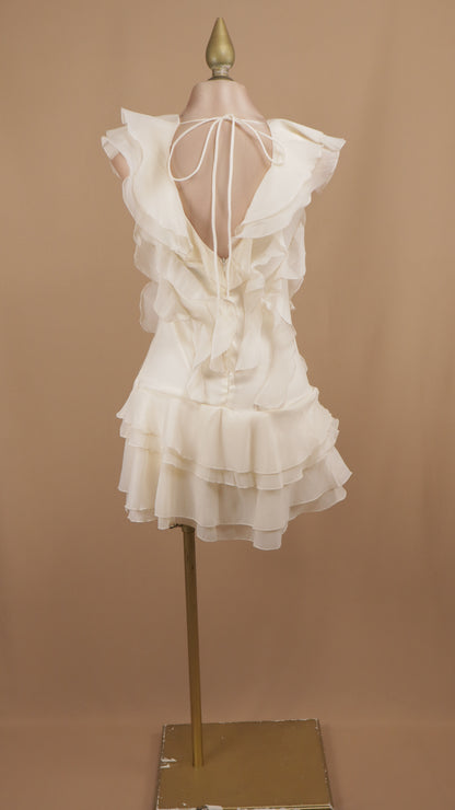 Vestido corto con escarolas y escote en espalda