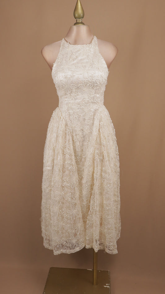 Vestido midi cuello halter con destellos