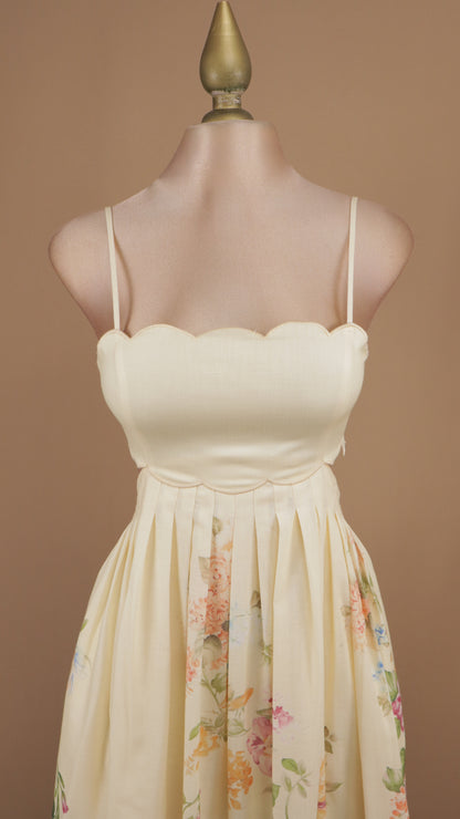 Vestido midi estampado con escote en la espalda y corset