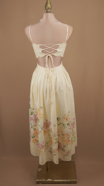 Vestido midi estampado con escote en la espalda y corset