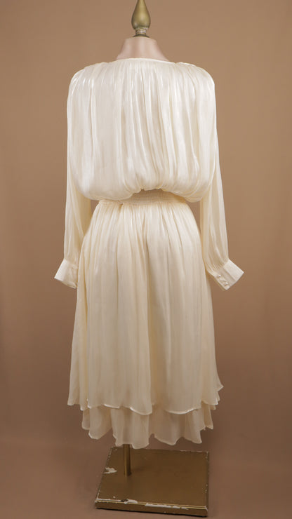 Vestido midi con manga larga y destellos