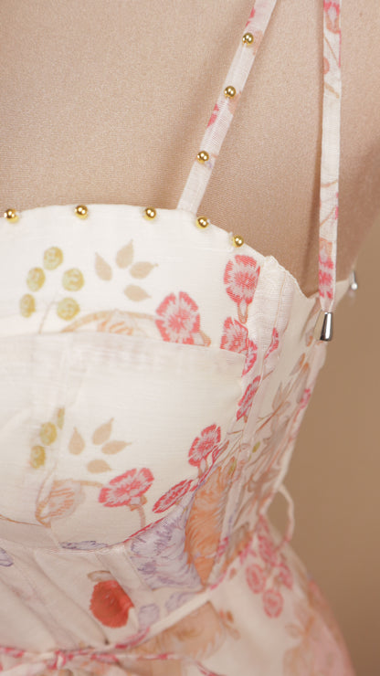 Vestido midi estampado con perlas doradas en tirantes