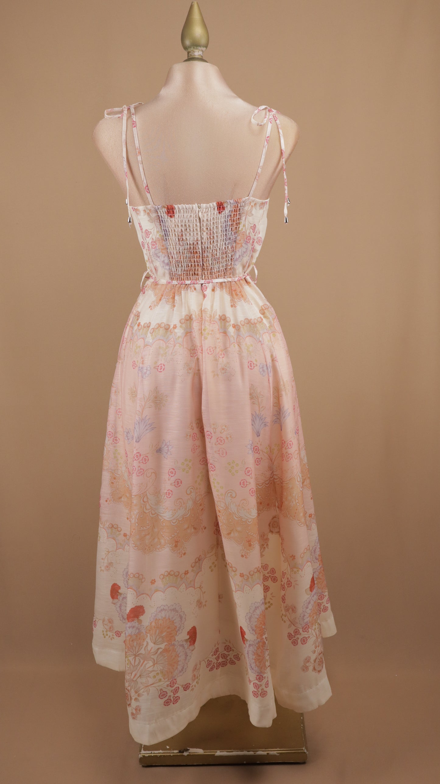 Vestido midi estampado con perlas doradas en tirantes