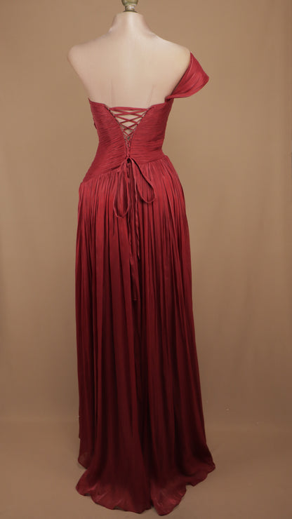 Vestido largo plisado asimétrico con corset