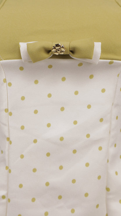 Vestido midi de cintura alta con estampado de lunares y detalle de moño