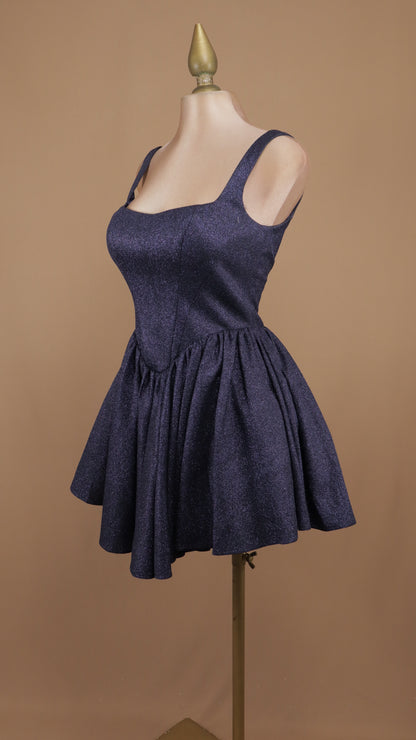 Vestido mid de brillo glíter con cintura de corsé y falda de tablas