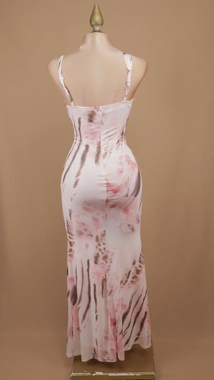 Vestido maxi con estampado de animal print y detalles metálicos descripción