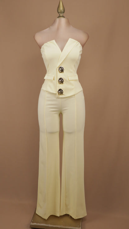 Palazzo sastrero strapless con top tipo chaleco y botones dorados