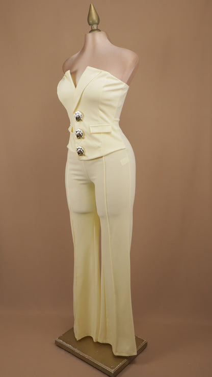 Palazzo sastrero strapless con top tipo chaleco y botones dorados