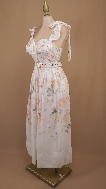 Vestido midi corsetero en lino soft con estampado floral romántico