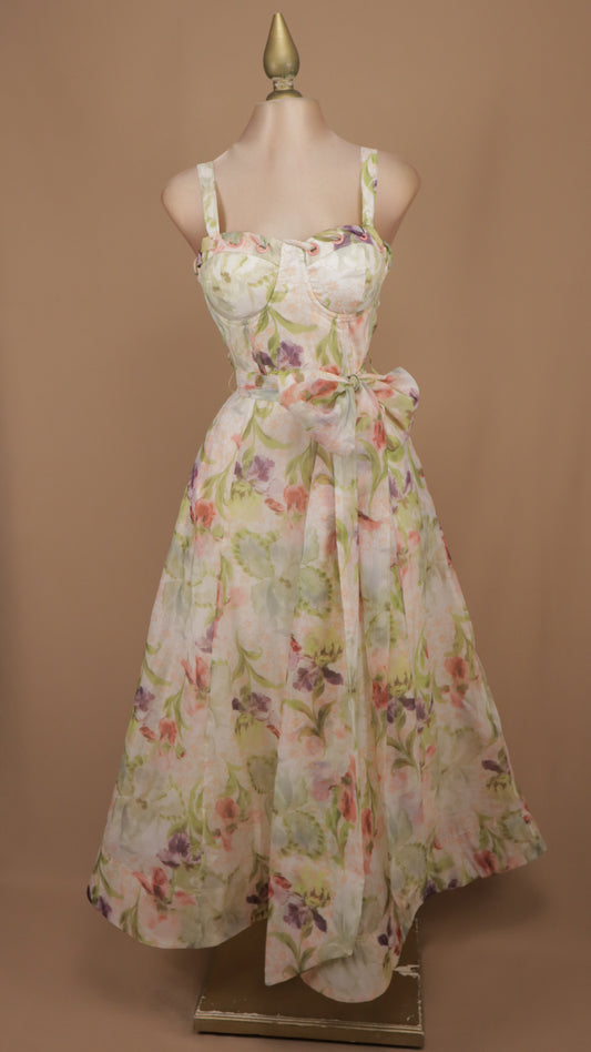 Vestido midi tipo bustier con estampado floral acuarela y lazo a la cintura