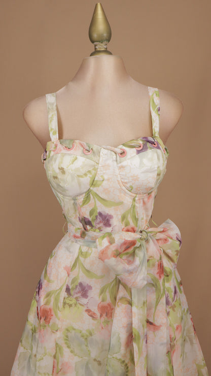 Vestido midi tipo bustier con estampado floral acuarela y lazo a la cintura