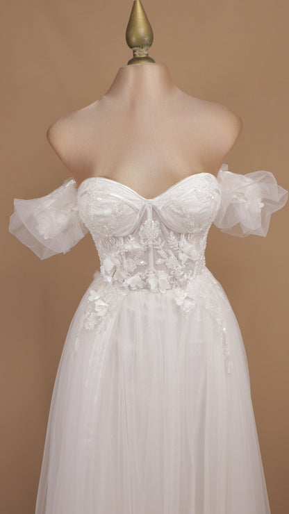 Vestido de gala romántico en línea A con escote corazón, corsé bordado y mangas abullonadas caídas