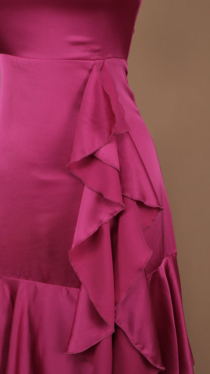 Vestido largo con olanes y corset