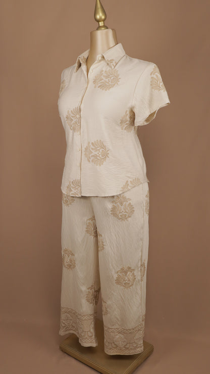 Conjunto plus size de pantalón y blusa