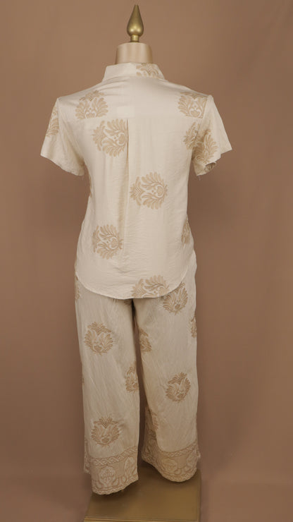 Conjunto plus size de pantalón y blusa