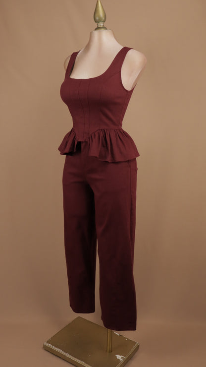 Conjunto de dos piezas de top estilo peplum y pantalón de pierna ancha