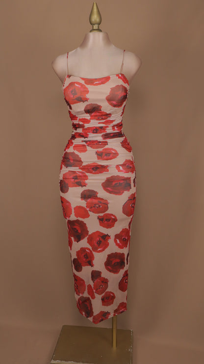 Vestido midi estampado de tirantes y plisado