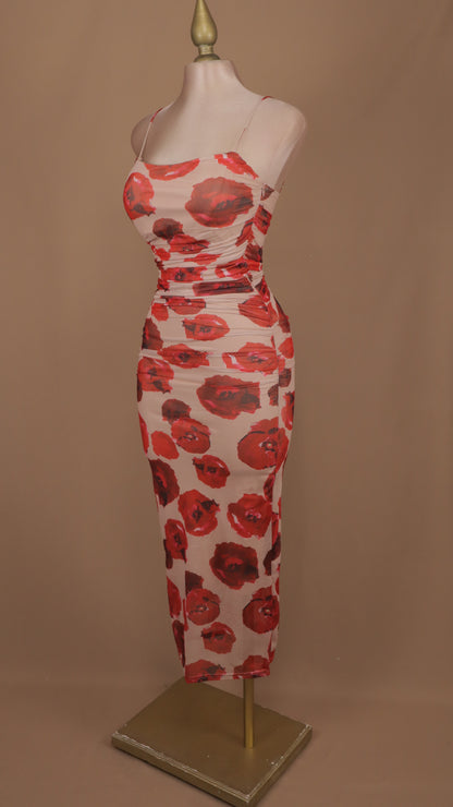 Vestido midi estampado de tirantes y plisado