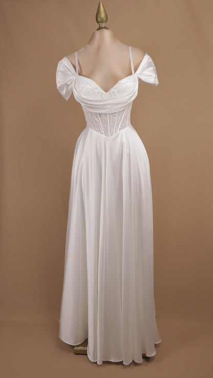 Vestido largo de novia al hombro con corse y falda satinada