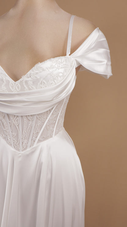 Vestido largo de novia al hombro con corse y falda satinada