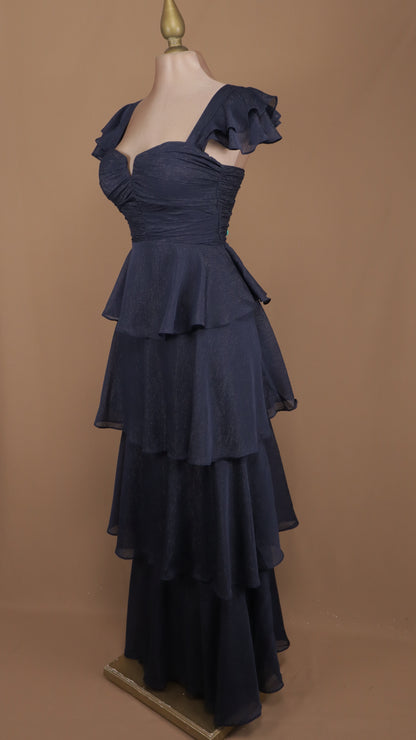 Vestido largo con olanes en falda y corset