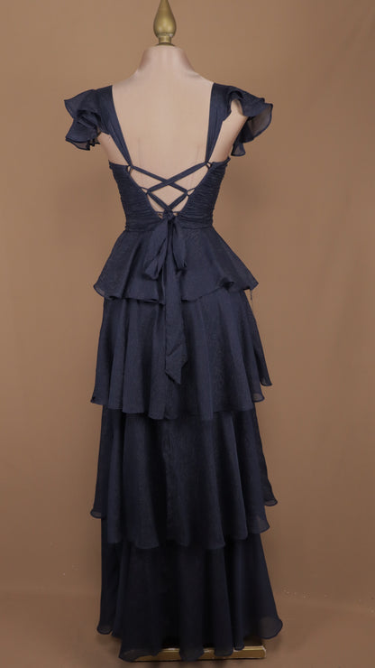 Vestido largo con olanes en falda y corset